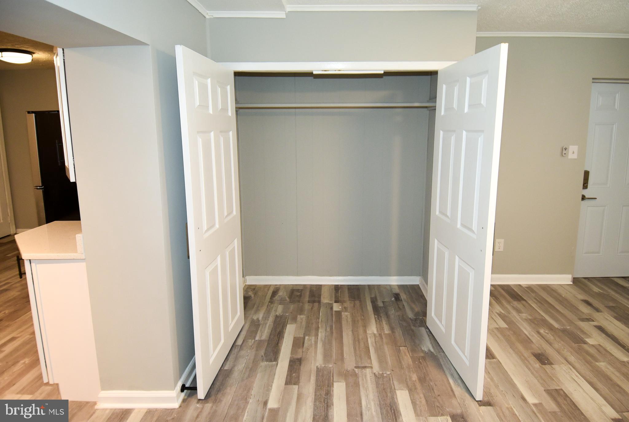 8208 Bellefonte Lane, Unit 3 Clinton, MD 20735 - Photo 29 of 38 a view of a room with wooden floor and a bathroom