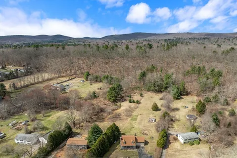 a view of a lake with mountains in the background