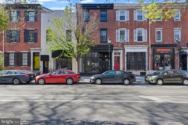 a cars parked in front of a building