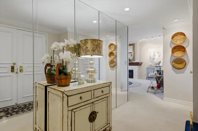 a bathroom with a sink a mirror and shower