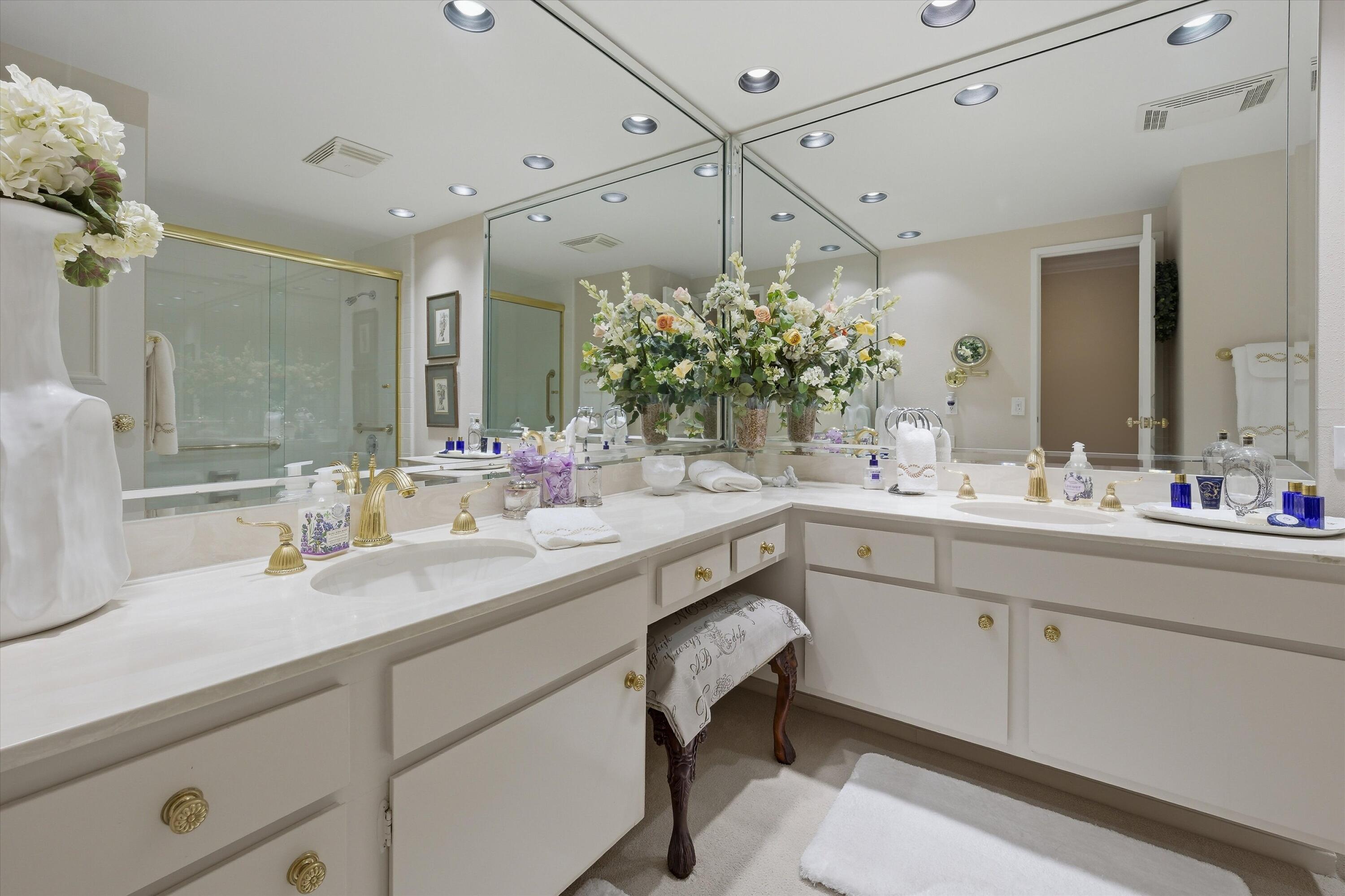 900 Island Drive, Unit 304 Rancho Mirage, CA 92270 - Photo 29 of 40 a bathroom with a sink and a mirror