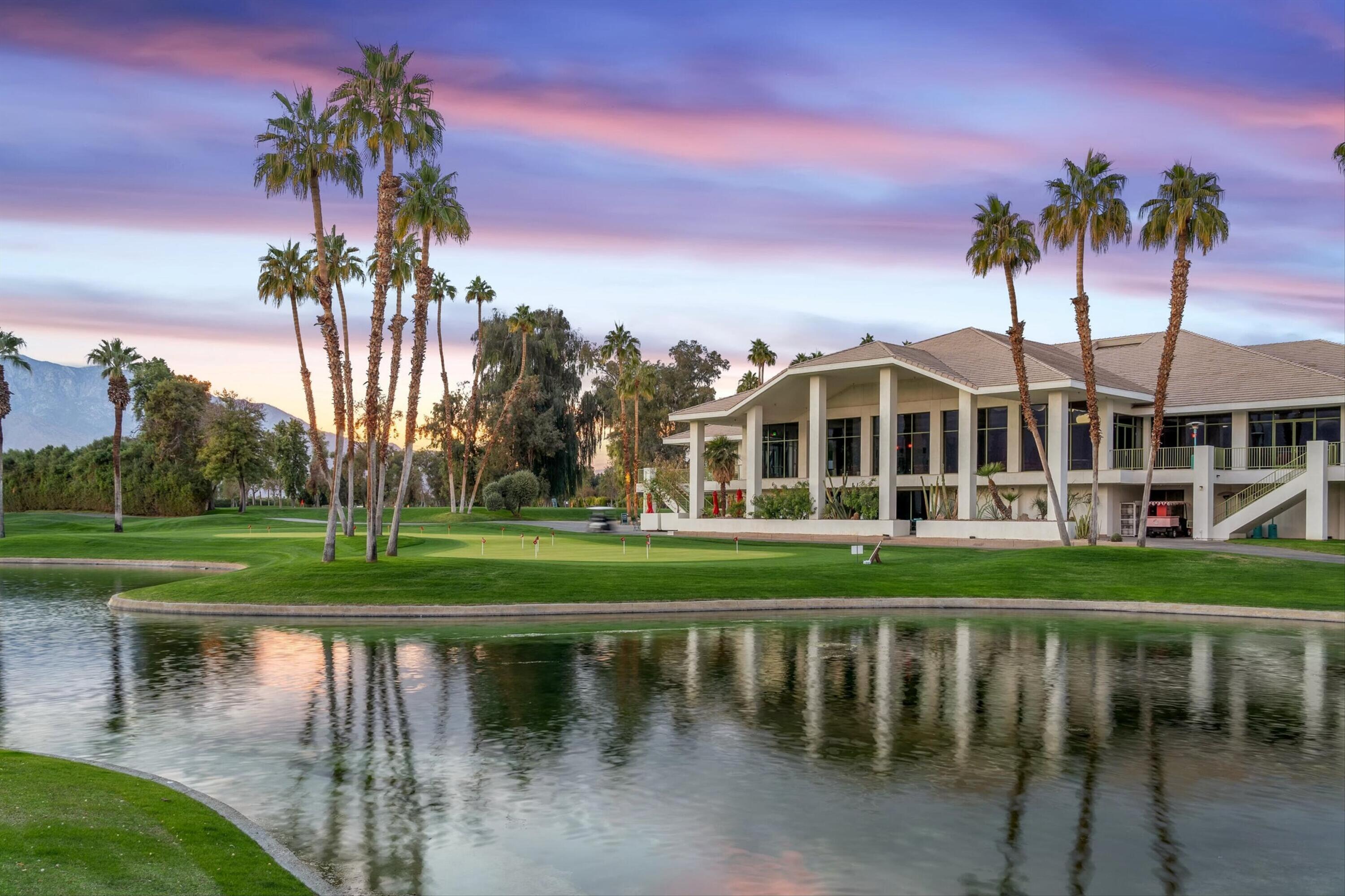 900 Island Drive, Unit 304 Rancho Mirage, CA 92270 - Photo 38 of 40 a view of a house with a yard