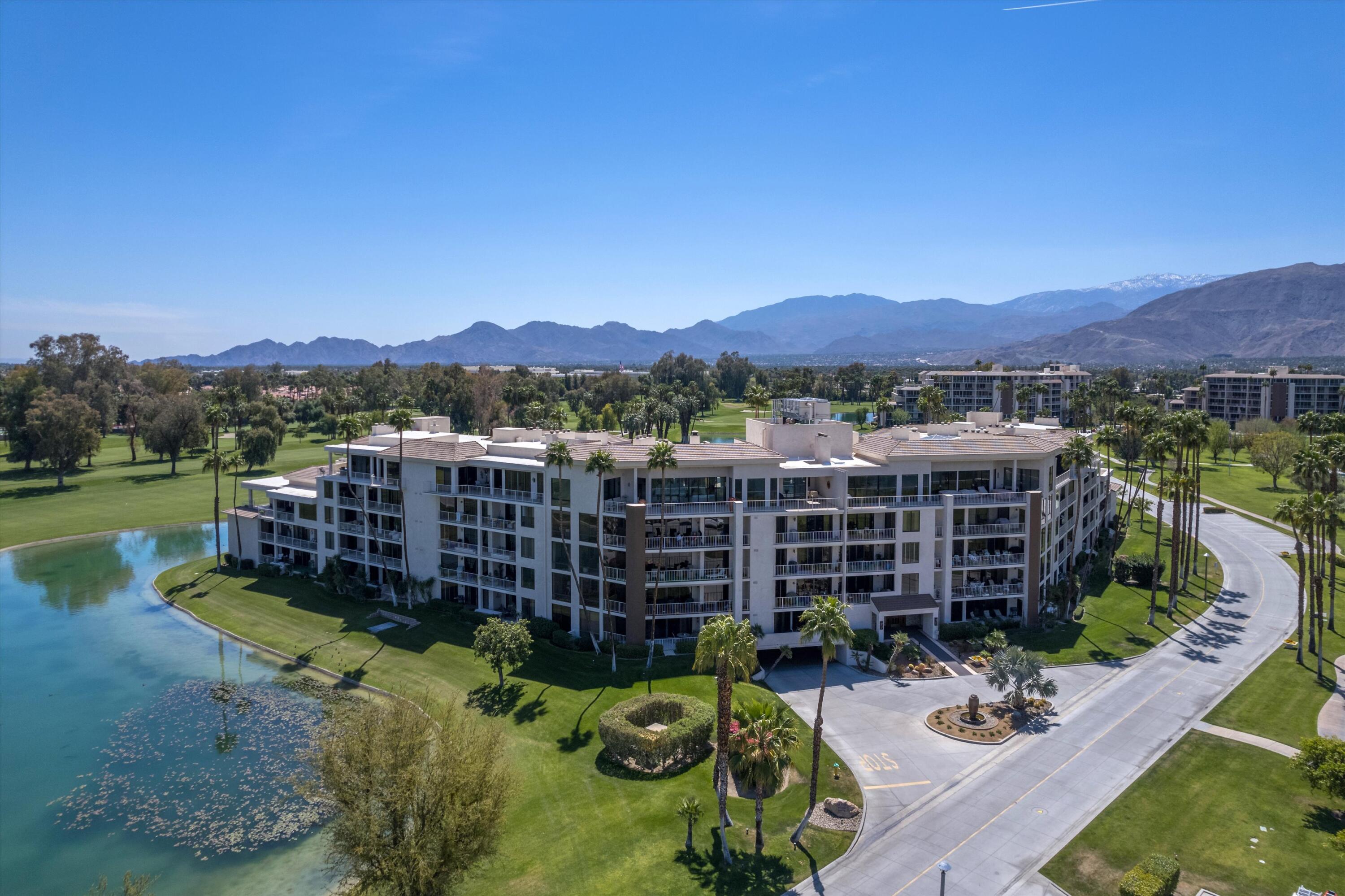 900 Island Drive, Unit 304 Rancho Mirage, CA 92270 - Photo 4 of 40 a view of a balcony with a table and chairs