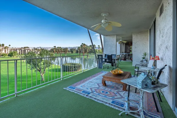 a garden view with a seating space