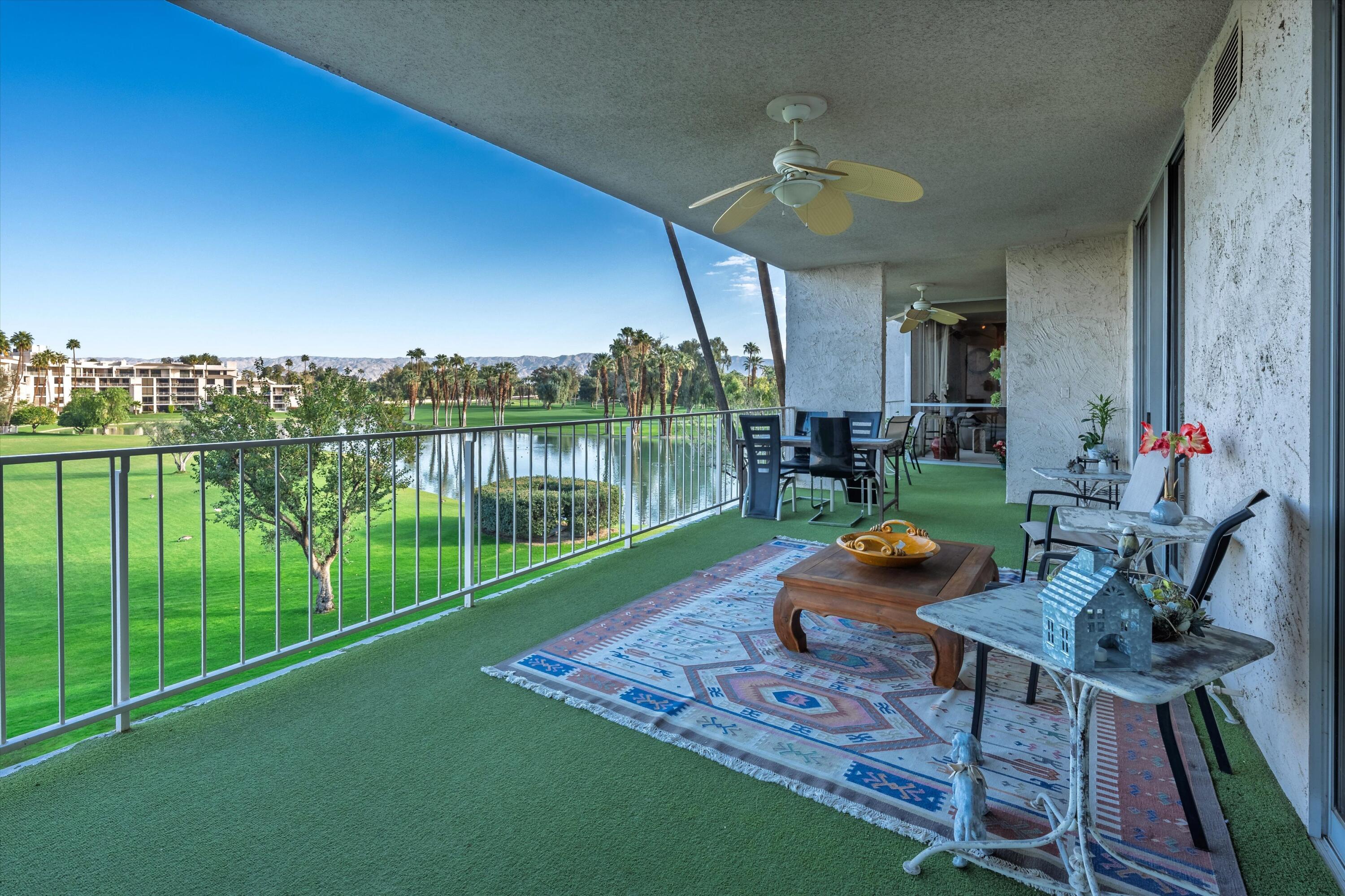 900 Island Drive, Unit 304 Rancho Mirage, CA 92270 - Photo 10 of 40 a garden view with a seating space