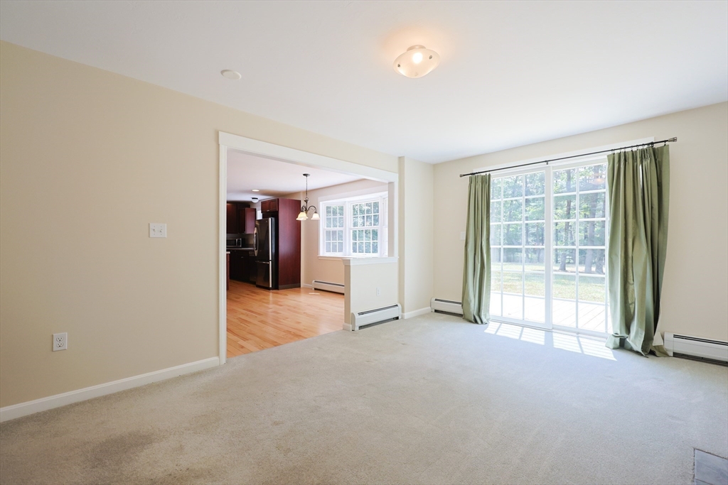 68 Dresser Hill Road, Unit 2 Dudley, MA 01571 - Photo 12 of 39 en empty room with windows