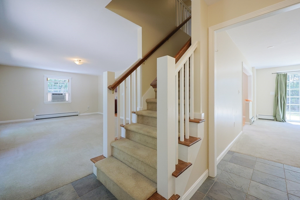 68 Dresser Hill Road, Unit 2 Dudley, MA 01571 - Photo 16 of 39 a view of an entryway with staircase