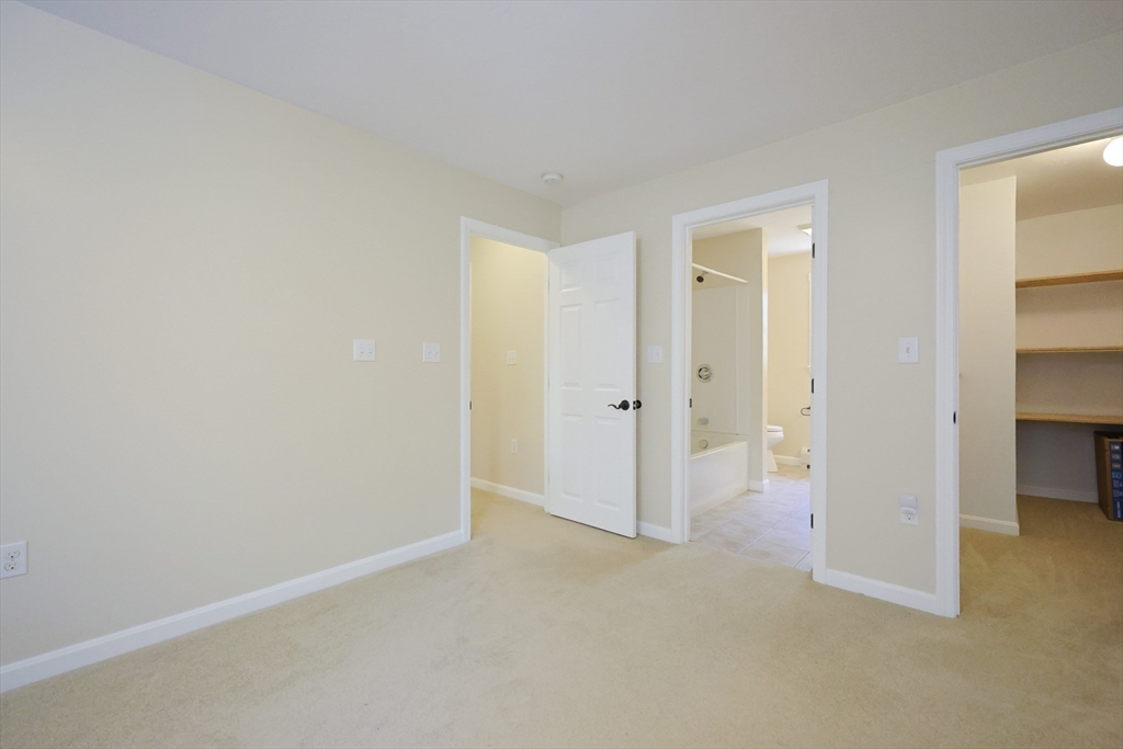 68 Dresser Hill Road, Unit 2 Dudley, MA 01571 - Photo 20 of 39 an empty room with closet