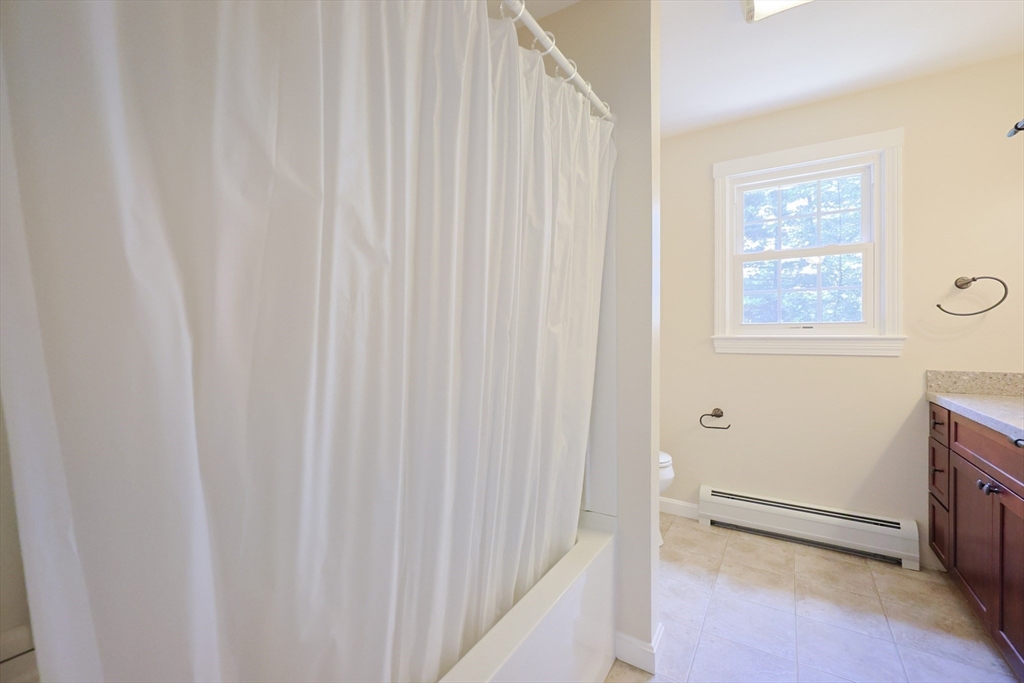 68 Dresser Hill Road, Unit 2 Dudley, MA 01571 - Photo 21 of 39 a view of an empty room with a window