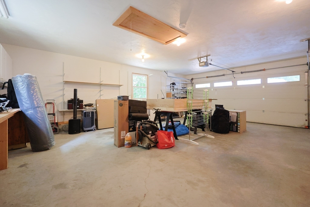 68 Dresser Hill Road, Unit 2 Dudley, MA 01571 - Photo 33 of 39 a view of a room with gym equipment