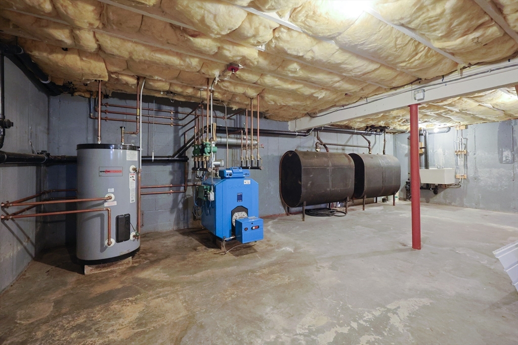 68 Dresser Hill Road, Unit 2 Dudley, MA 01571 - Photo 35 of 39 a view of a storage room