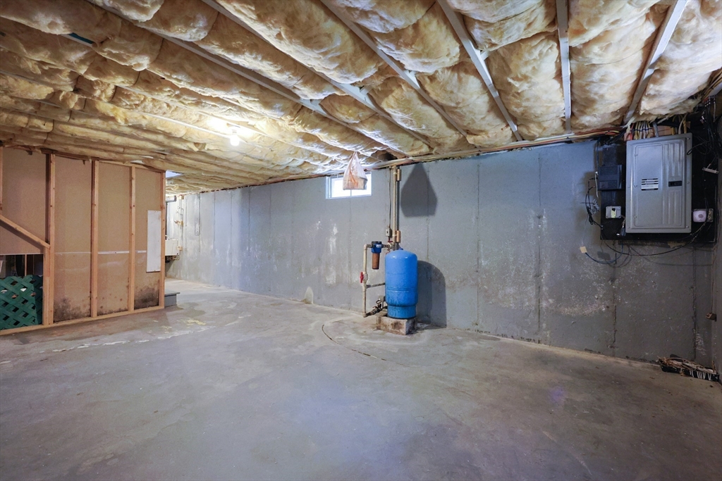 68 Dresser Hill Road, Unit 2 Dudley, MA 01571 - Photo 36 of 39 a view of empty room with wooden walls