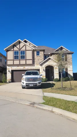 a car parked in front of a house
