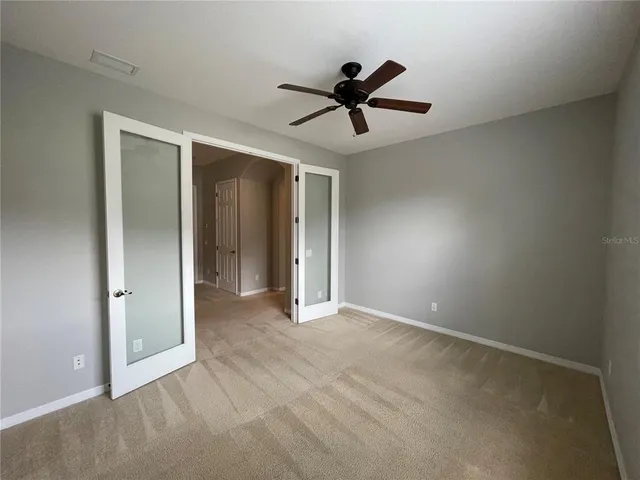 a view of large hall with a large window