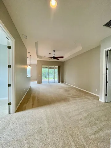a view of a kitchen with a sink and a window