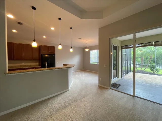 a view of a kitchen and a sink