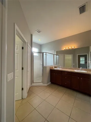 a view of a pool with a patio