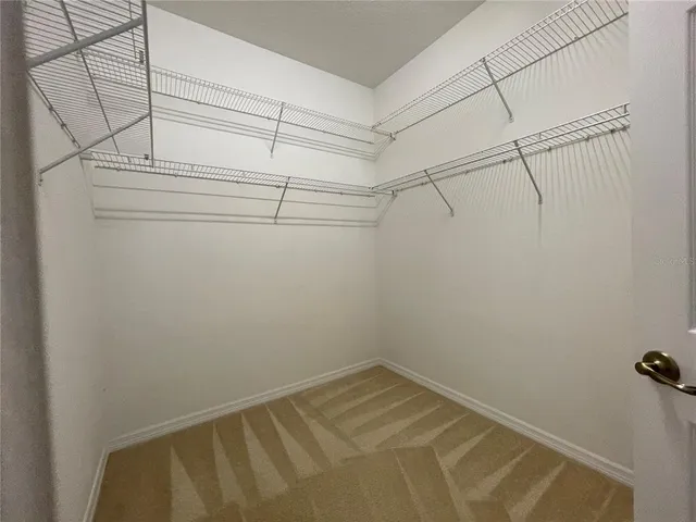 a sign board with yard in front of it