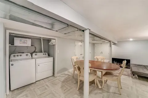 a view of dining room and livingroom with furniture