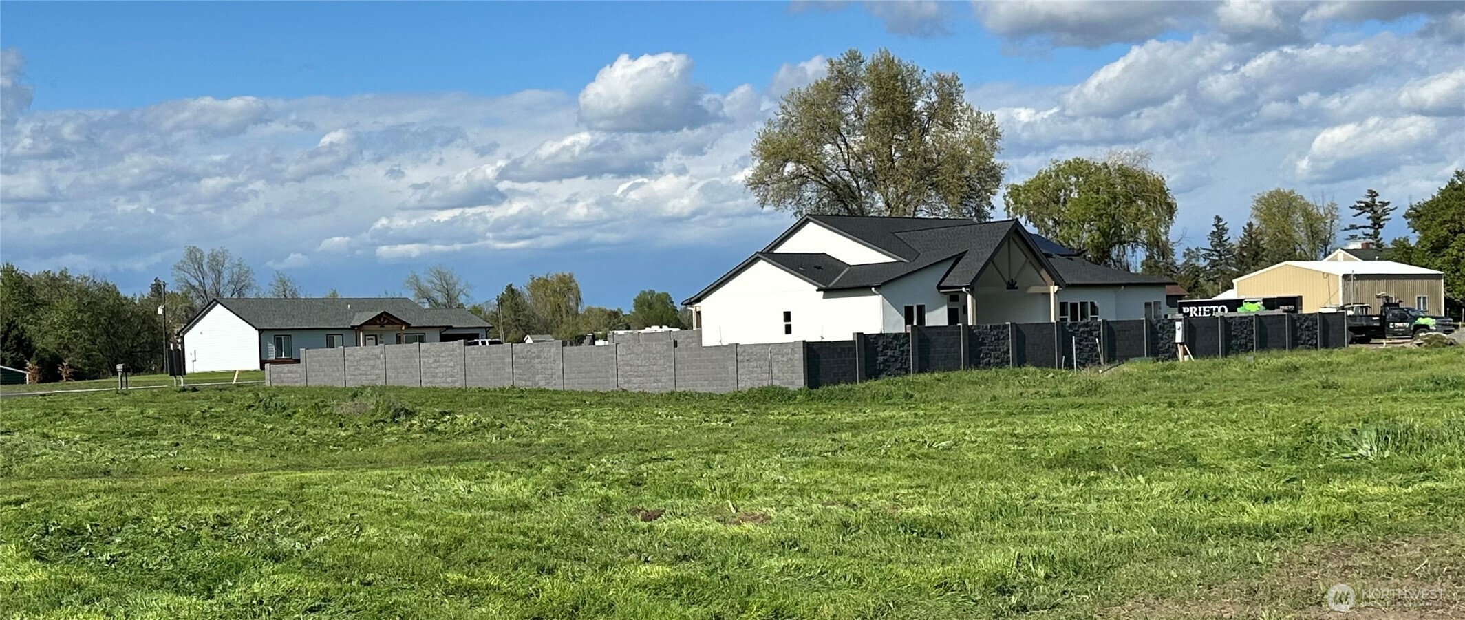571 Southwest 12th Street College Place, WA 99324 - Photo 3 of 20 a view of a house with a yard and sitting area