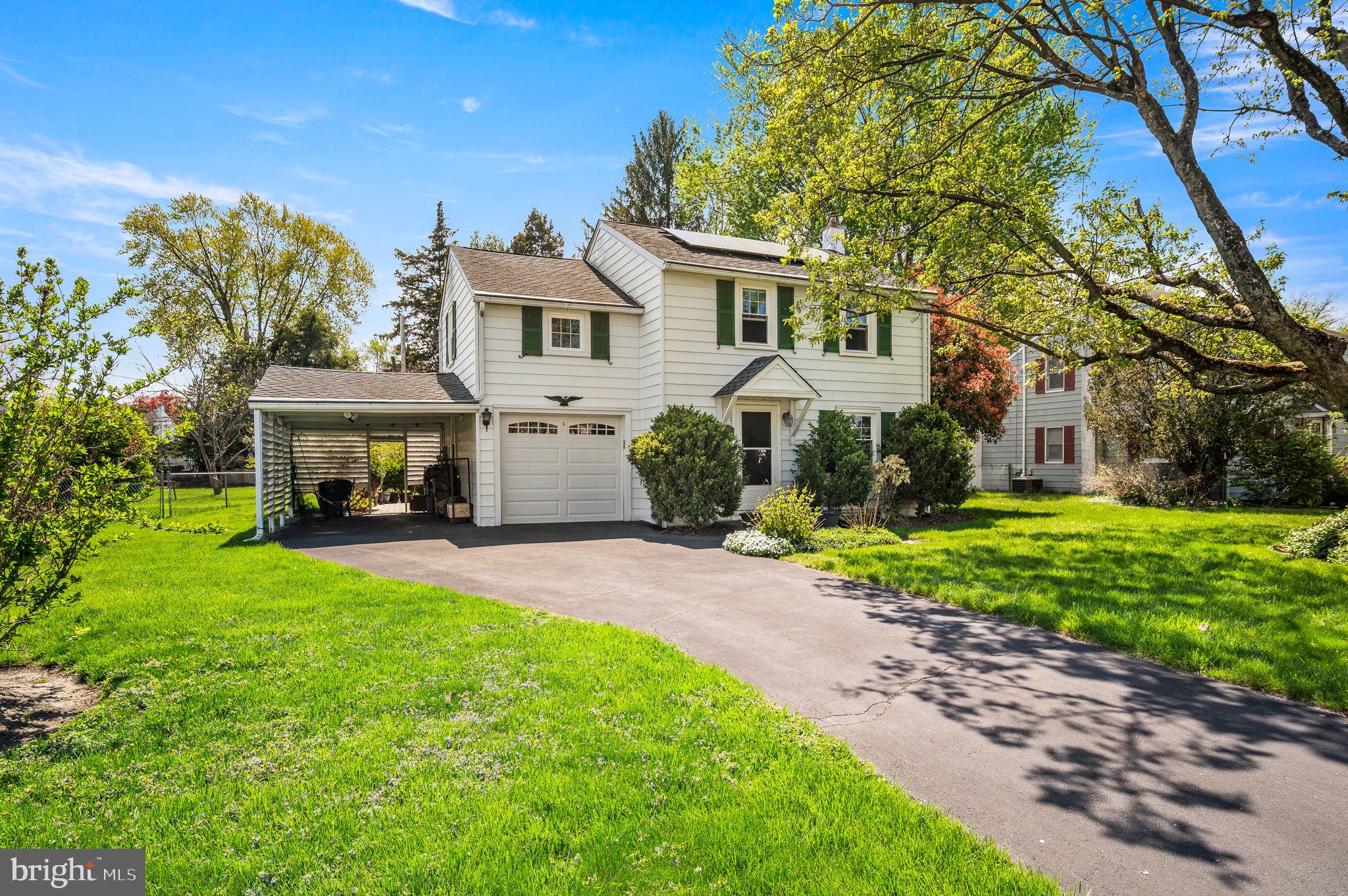 416 Preston Lane Hatboro, PA 19040 - Photo 1 of 24 a front view of a house with garden and porch
