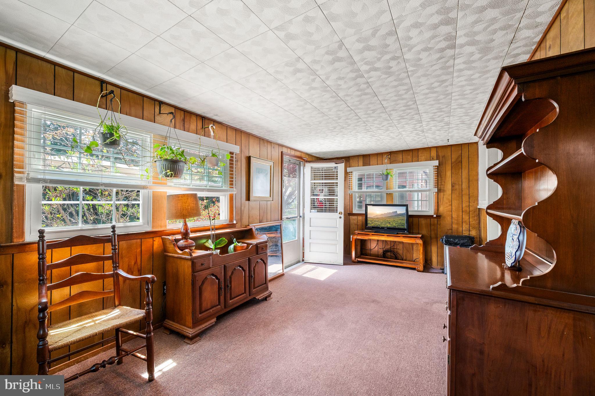 416 Preston Lane Hatboro, PA 19040 - Photo 11 of 24 a bedroom with furniture and a large window