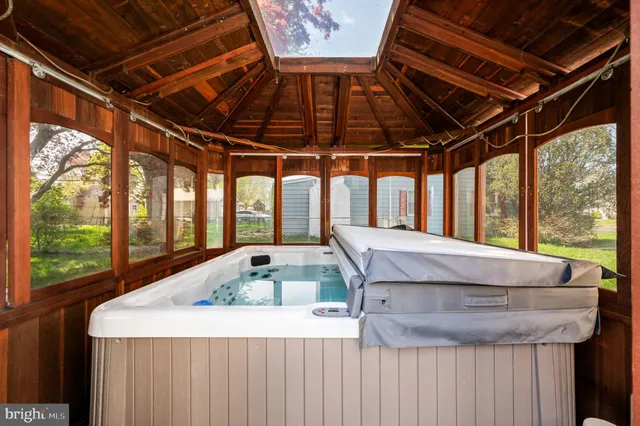 a kitchen with a table and chairs