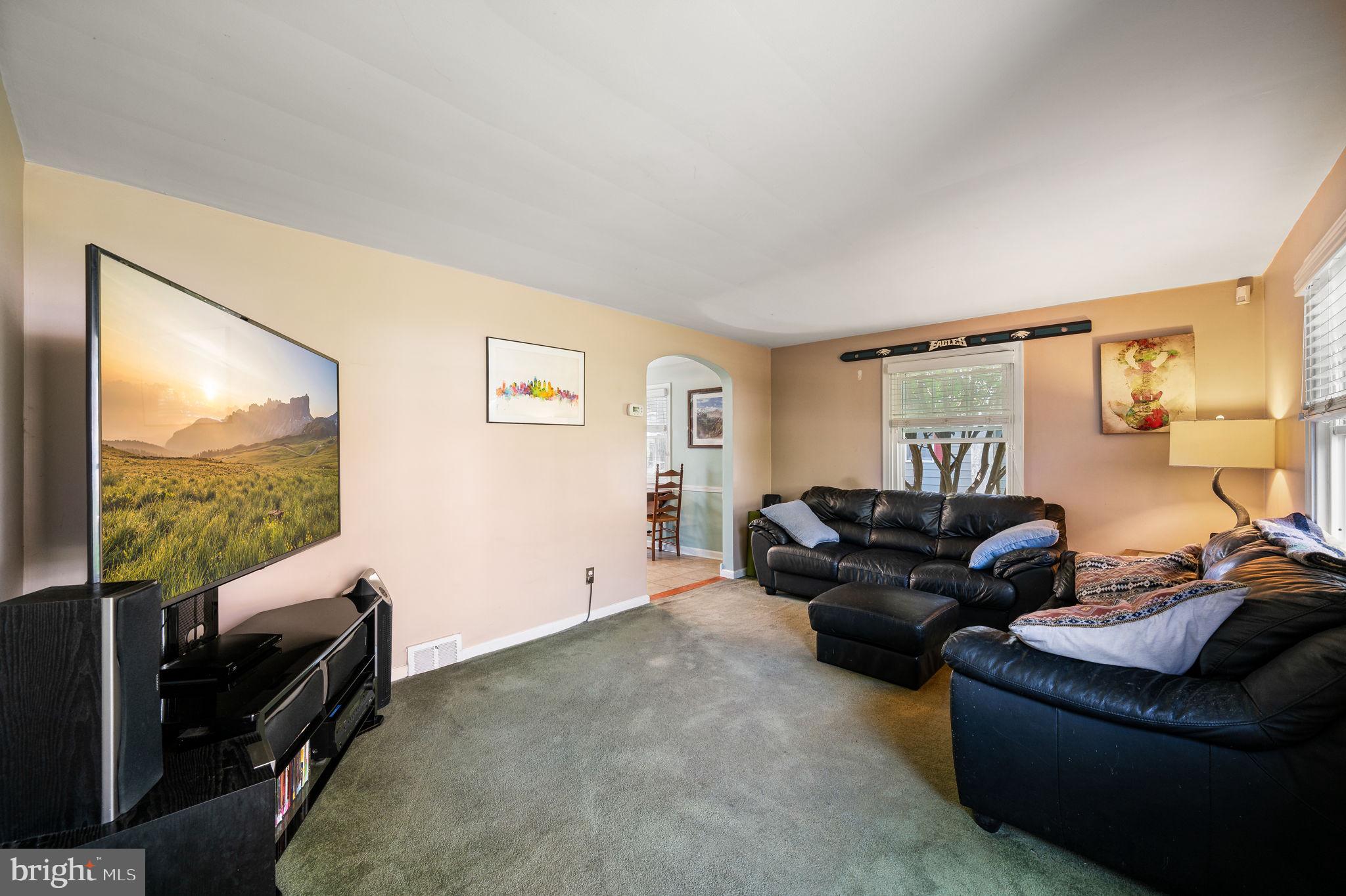 416 Preston Lane Hatboro, PA 19040 - Photo 10 of 24 a living room with furniture and a flat screen tv