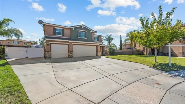 a house view with a garden space