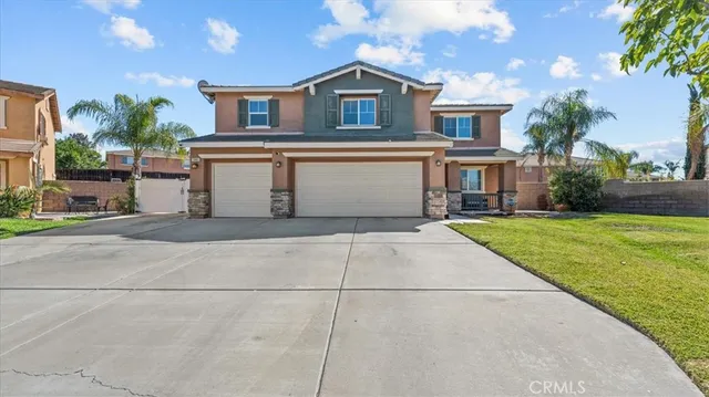 a front view of a house with yard