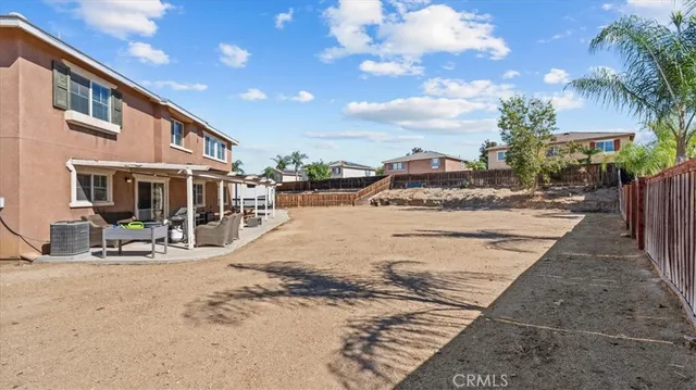 a view of a house with sitting area
