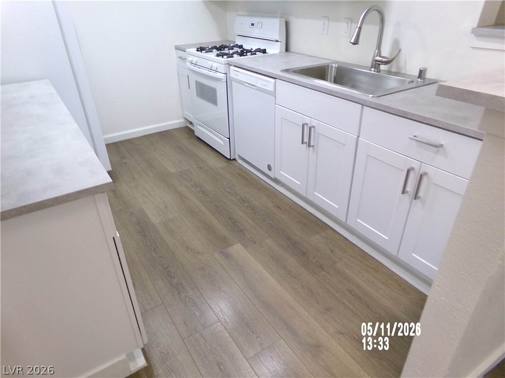2995 East Sunset Road, Unit 222 Las Vegas, NV 89120 - Photo 4 of 29 This modern kitchen features sleek countertops, ample storage, and durable flooring for everyday living.