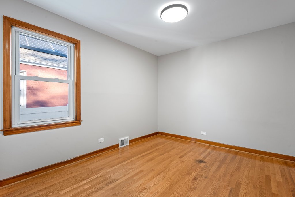 1619 North 20th Avenue Melrose Park, IL 60160 - Photo 10 of 40 an empty room with a window