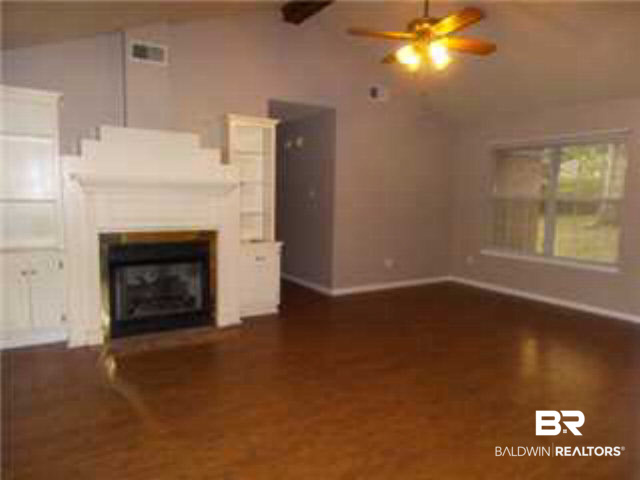 1290 Burnt Tree Drive East Mobile, AL 36695 - Photo 2 of 15 Living room with built ins and fireplace