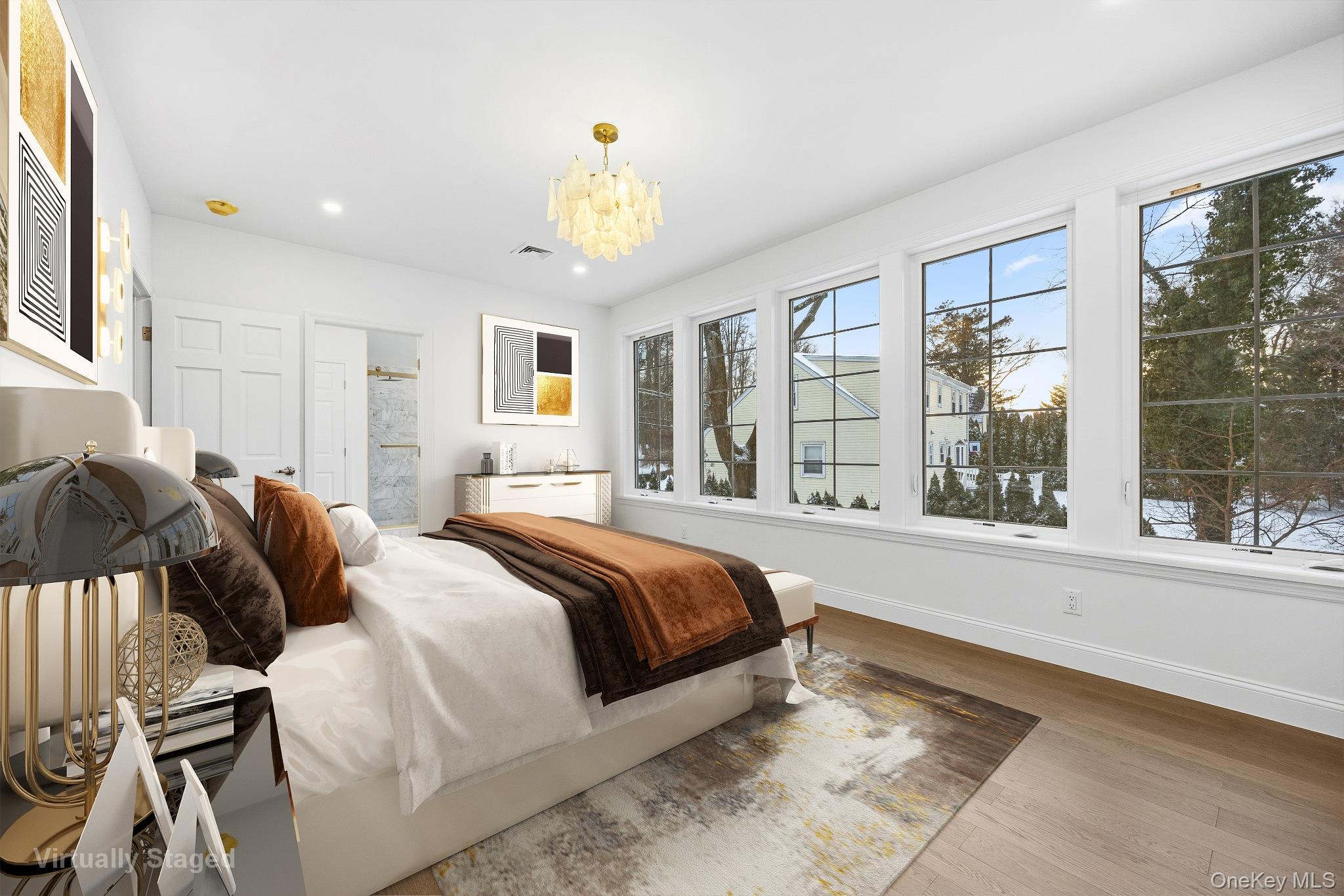2 Wynmor Road Scarsdale, NY 10583 - Photo 20 of 38 a spacious bedroom with a large bed and a large window