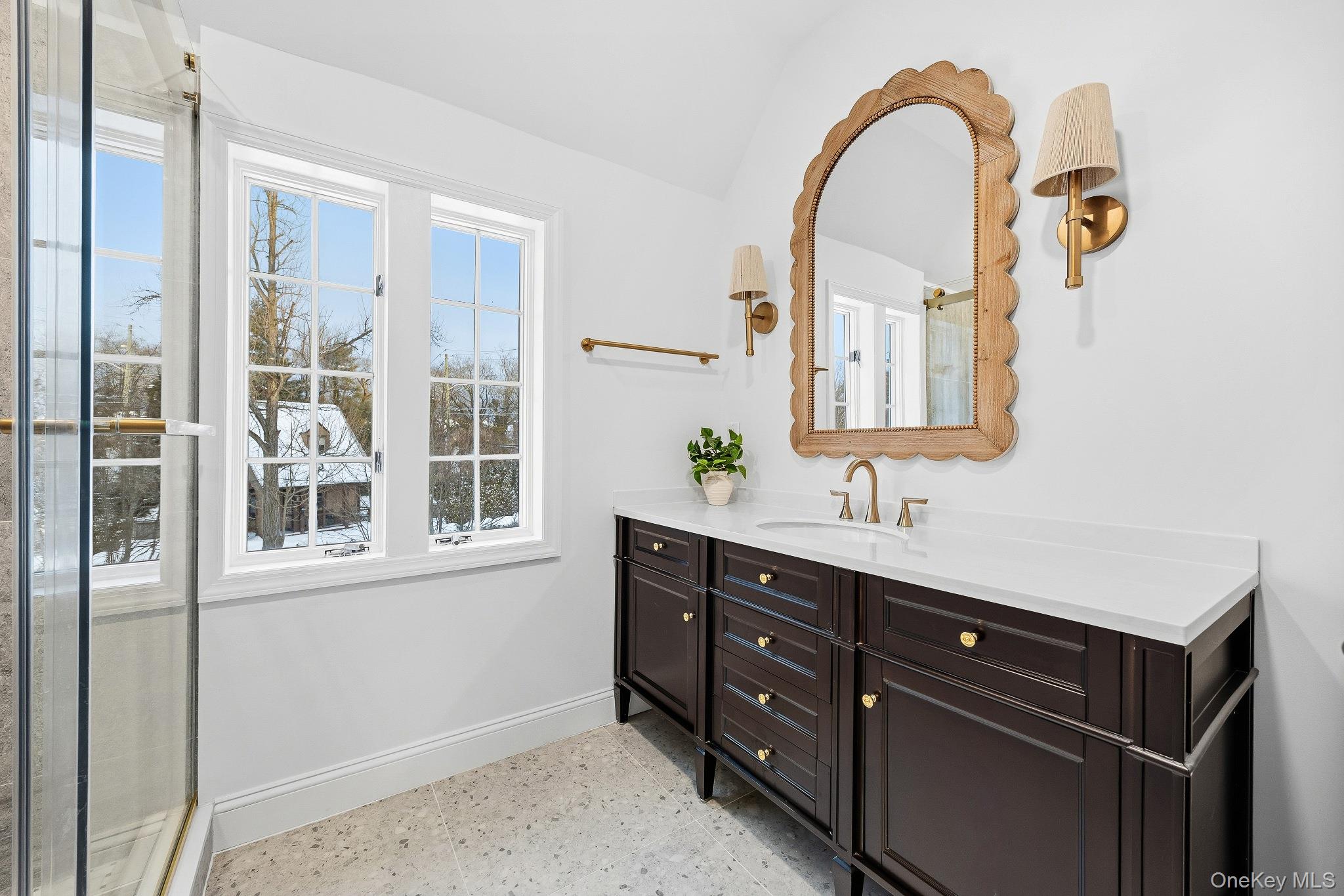 2 Wynmor Road Scarsdale, NY 10583 - Photo 31 of 38 a bathroom with a double vanity sink and a mirror