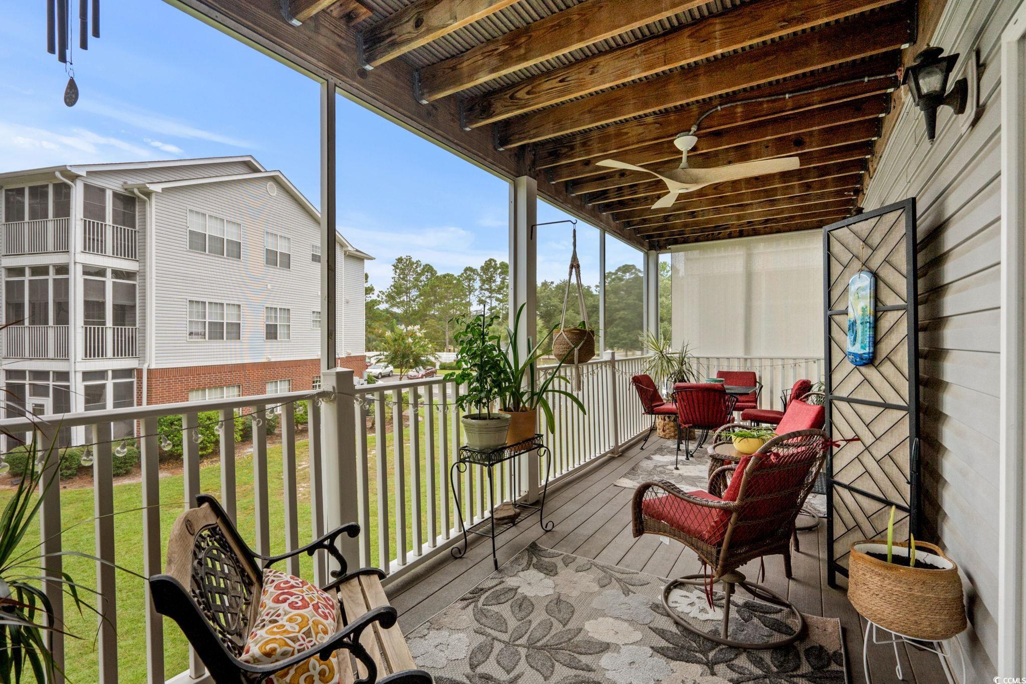 4849 Meadowsweet Drive, Unit 1606 Myrtle Beach, SC 29579 - Photo 15 of 36 Balcony featuring ceiling fan