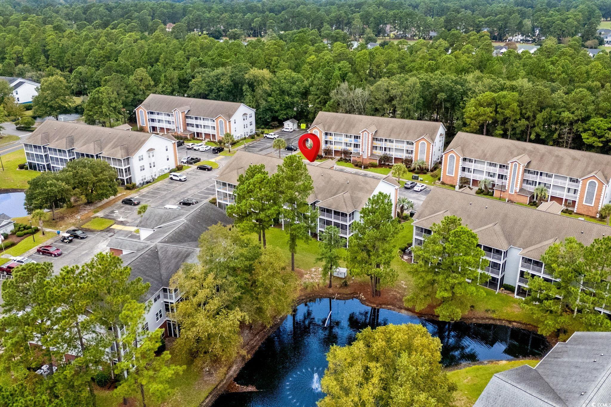 4849 Meadowsweet Drive, Unit 1606 Myrtle Beach, SC 29579 - Photo 2 of 36 Aerial view of apartment complex / building and a nearby body of water
