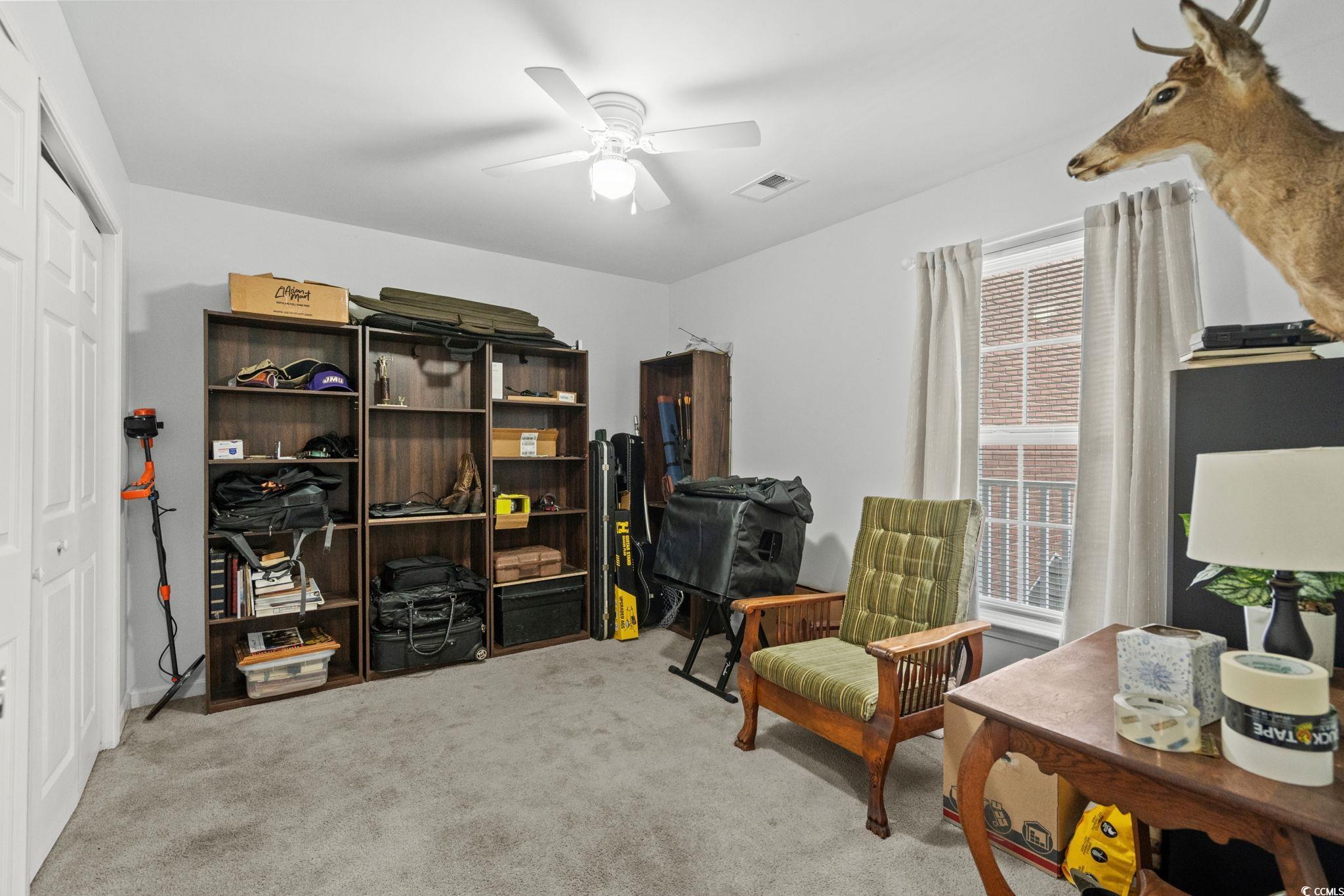 4849 Meadowsweet Drive, Unit 1606 Myrtle Beach, SC 29579 - Photo 23 of 36 Sitting room with light colored carpet and a ceiling fan