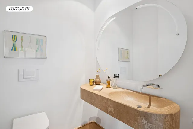 a bathroom with a bathtub and a sink