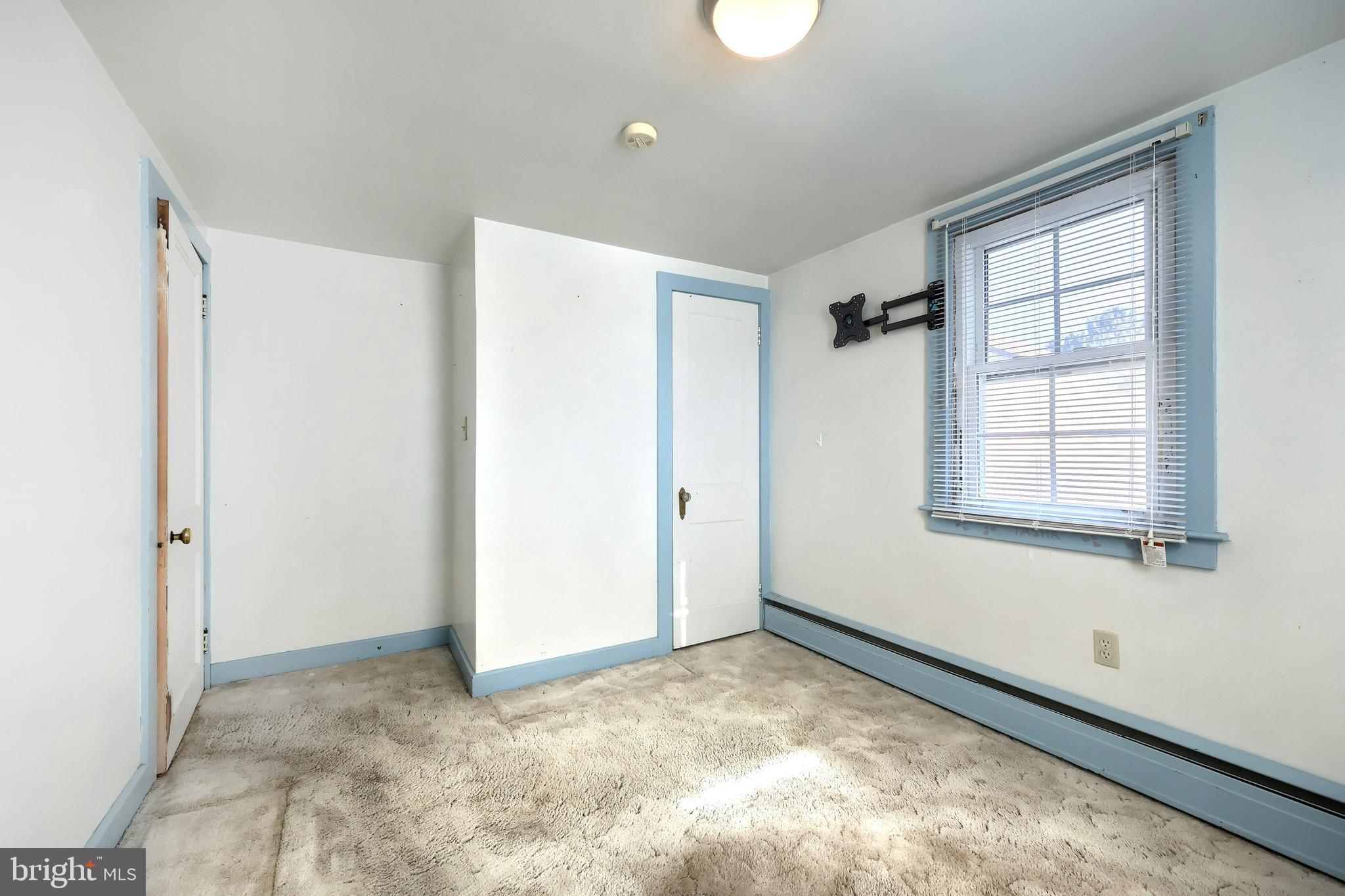 64 Baltimore Street Spring Grove, PA 17362 - Photo 16 of 58 a view of an empty room with a window