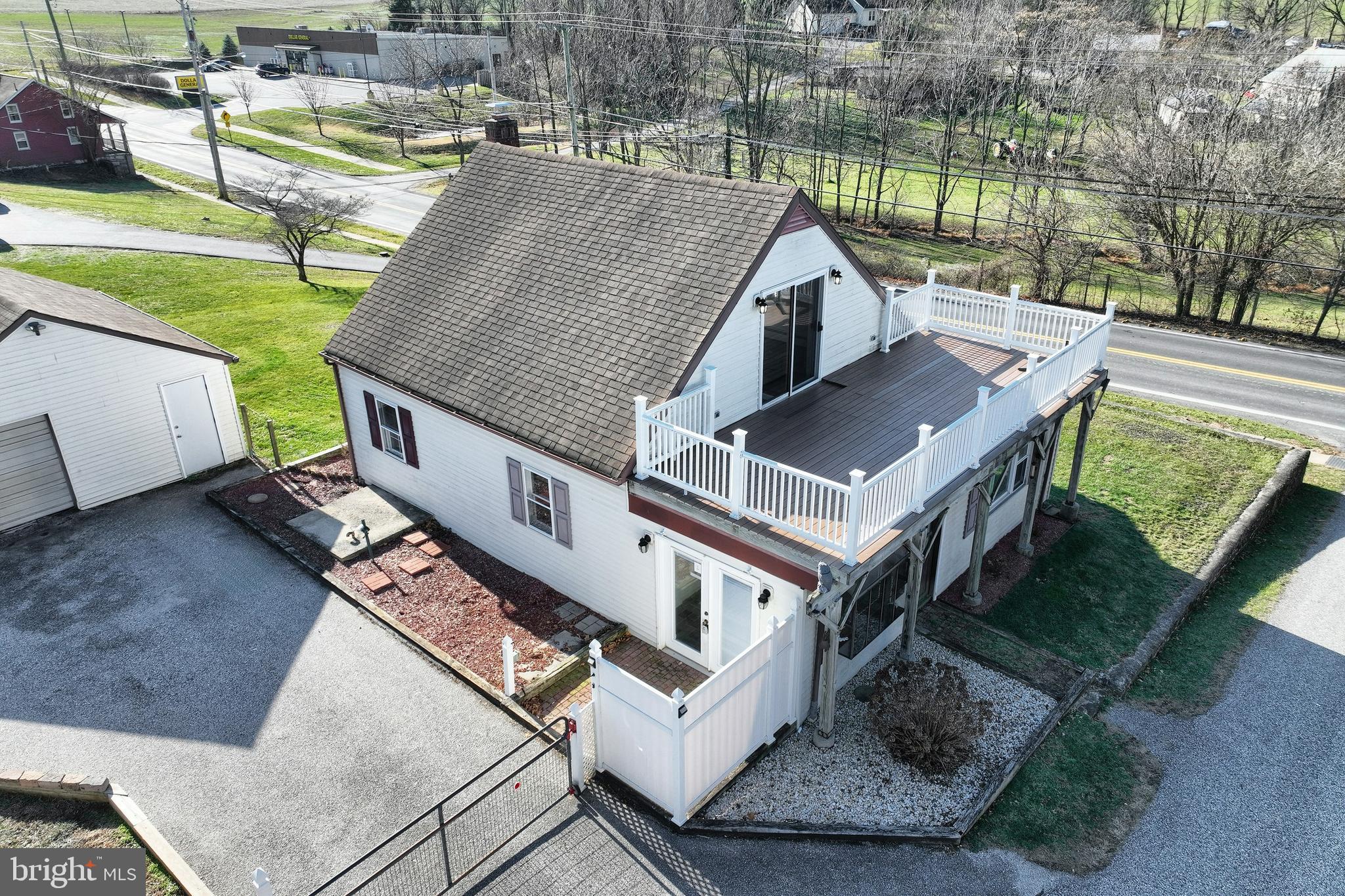 64 Baltimore Street Spring Grove, PA 17362 - Photo 47 of 58 an aerial view of a house with garden space and swimming pool