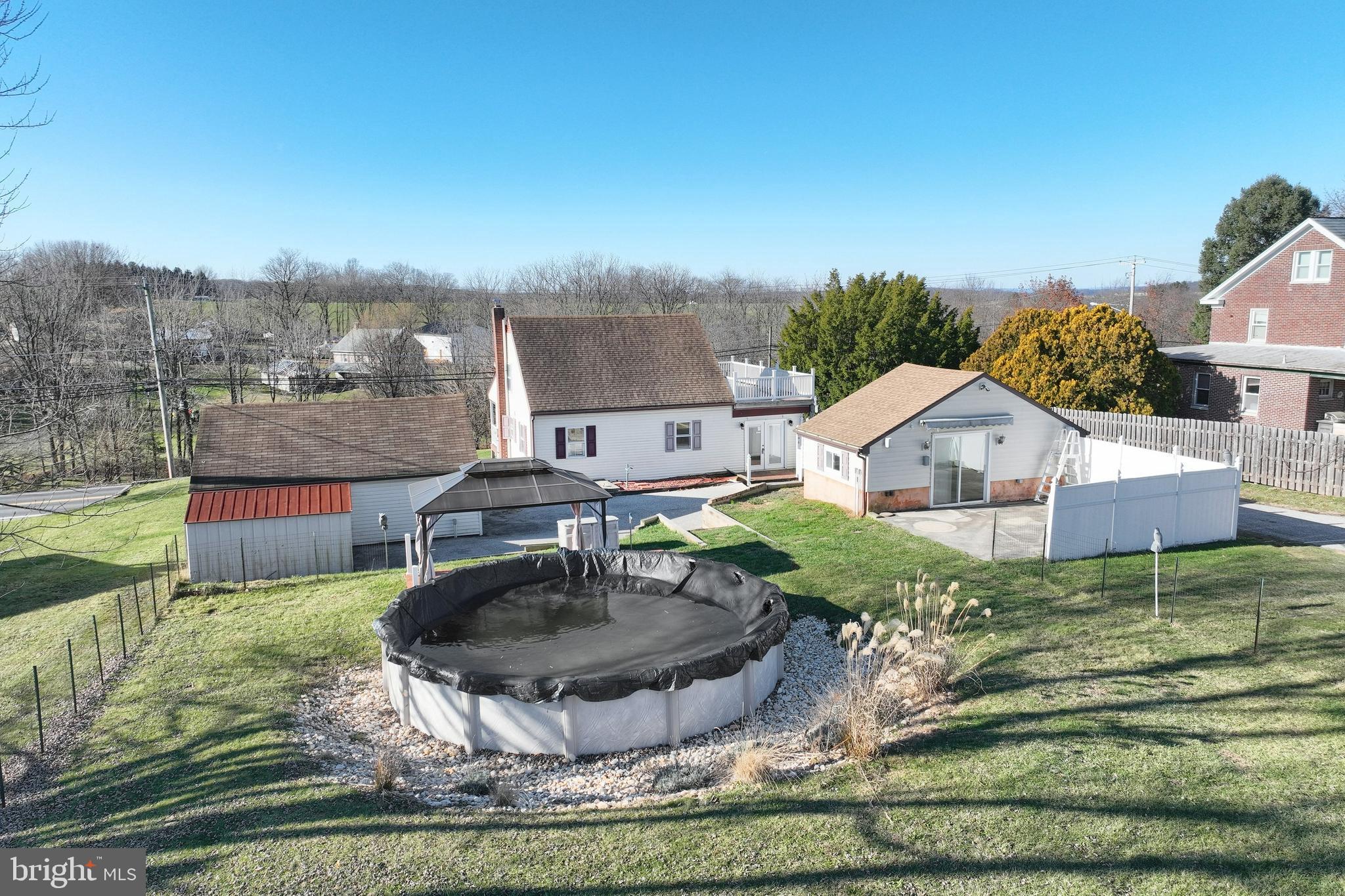 64 Baltimore Street Spring Grove, PA 17362 - Photo 5 of 58 a swimming pool with outdoor seating and yard