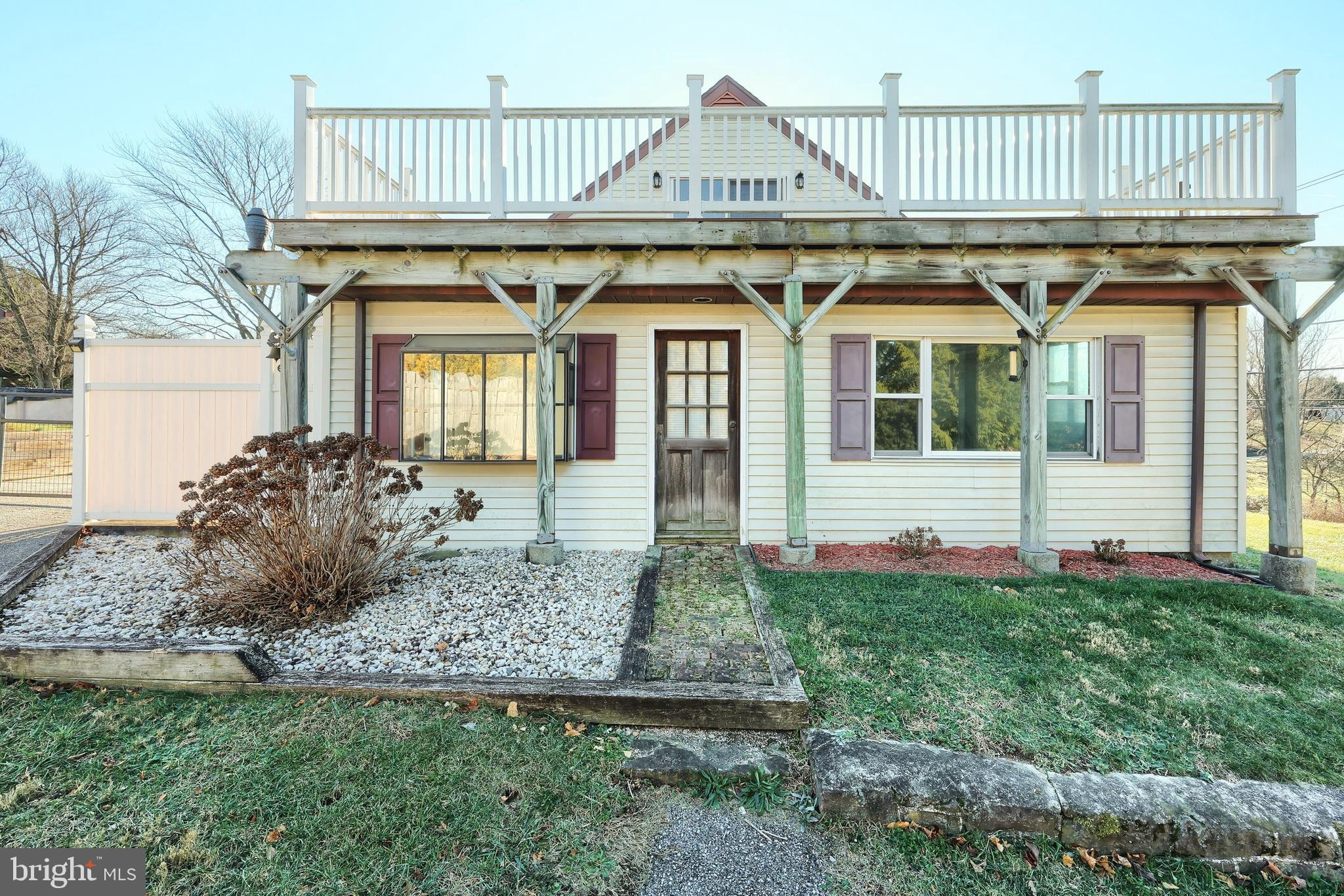 64 Baltimore Street Spring Grove, PA 17362 - Photo 7 of 58 a view of a house with a small yard and wooden floor and fence