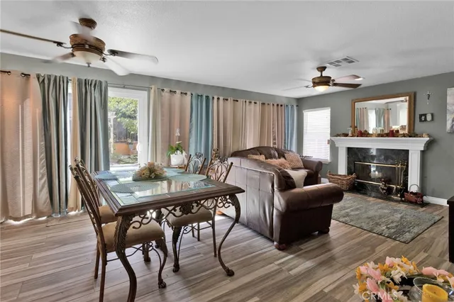 a view of a livingroom with furniture and a fireplace