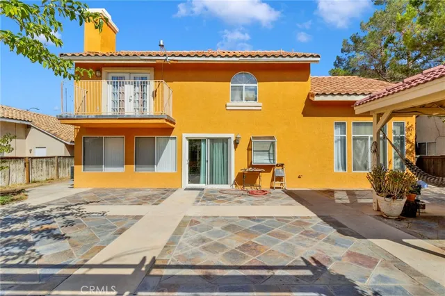 a front view of a house with patio