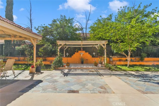a view of a park with large trees