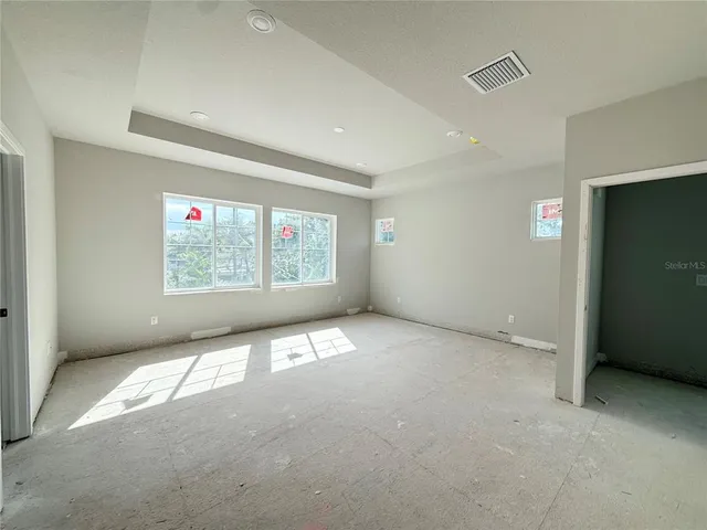 a bathroom with a double vanity sink and mirror