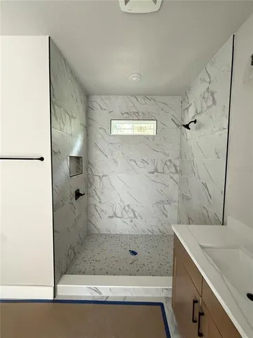 a view of a backyard of the house