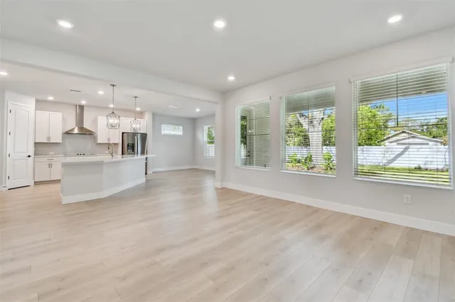 a view of a bathroom with wooden floor